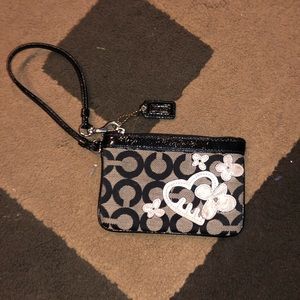 Black Coach wristlet with white heart